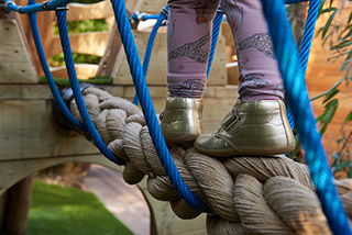 a child playing in the miniohome nursery garden